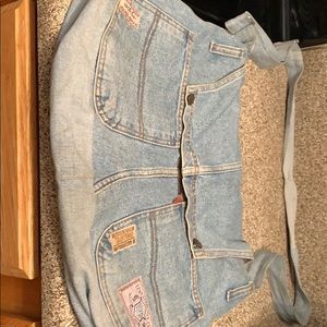 Hand stitched denim messenger bag.